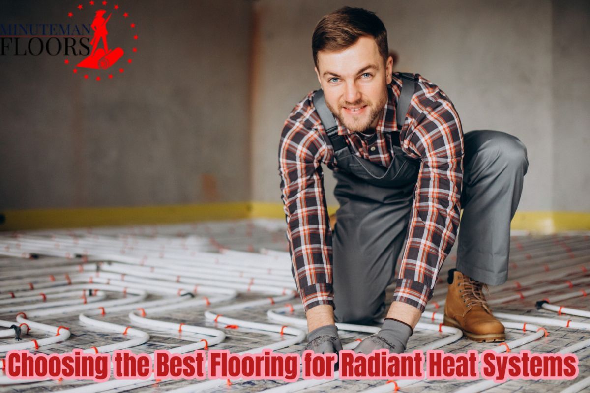 Professional flooring installer working on radiant floor heating system – Minuteman Floors, Manchester NH